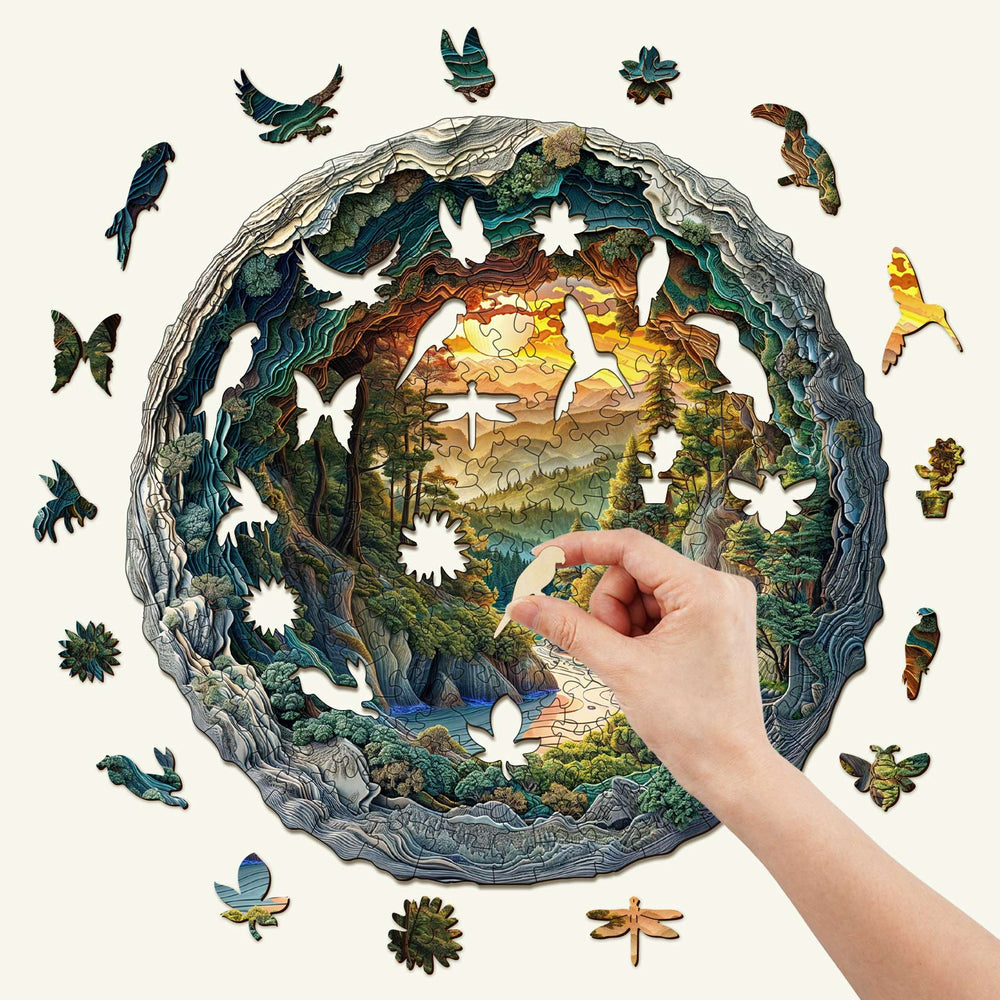 3D cave forest wooden jigsaw puzzle with hand placing a piece among colorful forest and wildlife cutouts.
