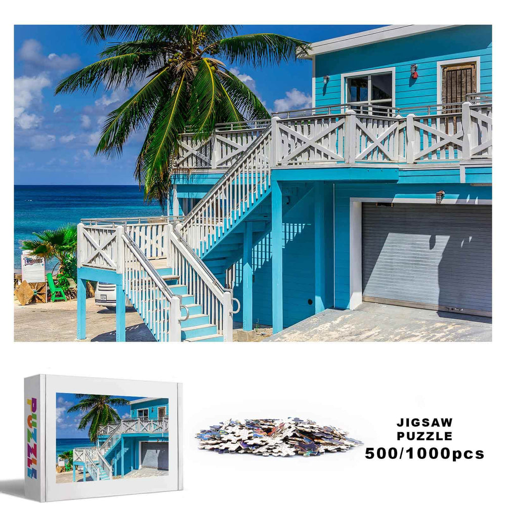 Summer Style 500/1000 piece jigsaw puzzle featuring a coastal blue house and ocean view, perfect for mind games.