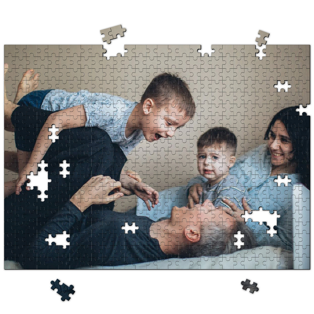 Family enjoying a custom 1000-piece jigsaw puzzle together, capturing cherished memories.