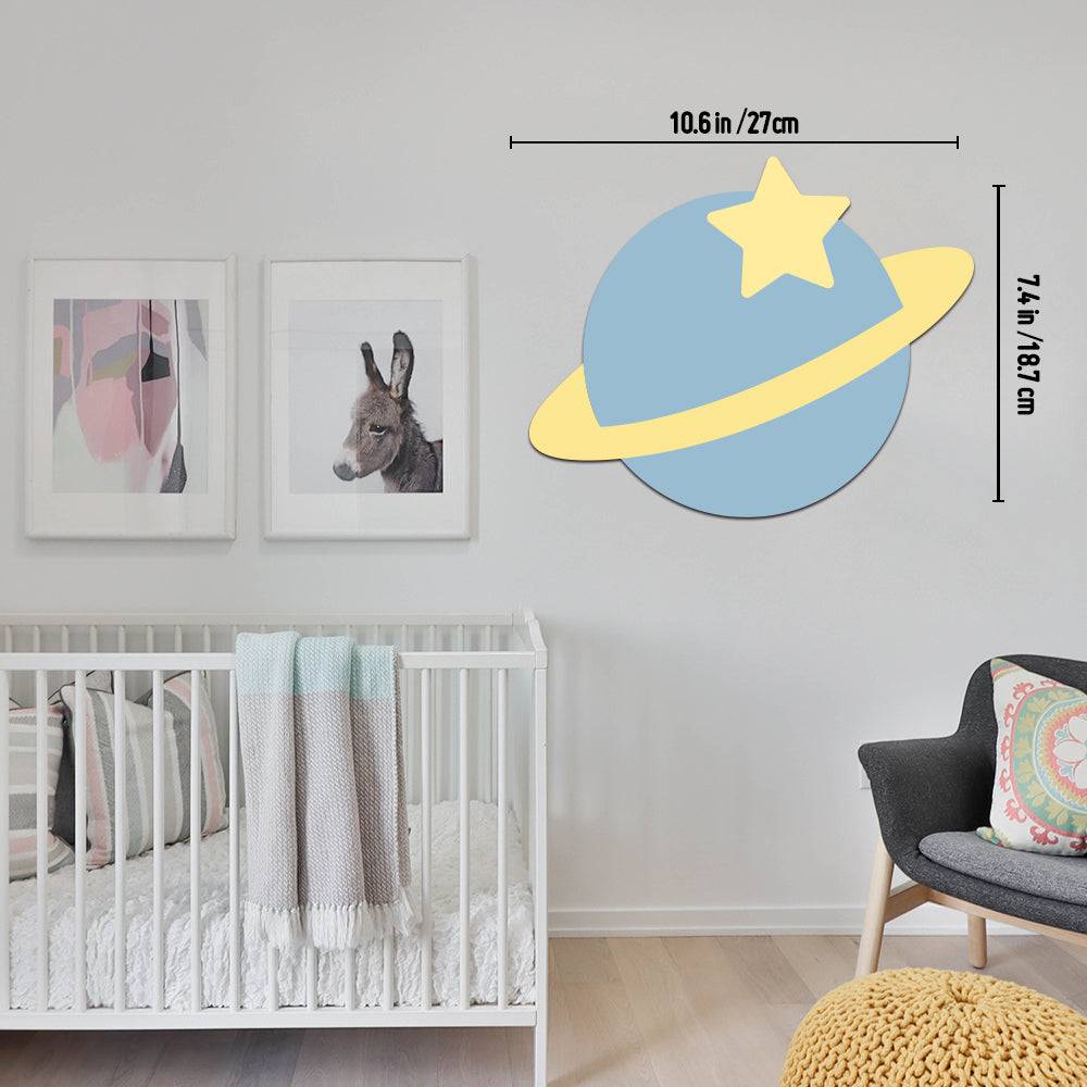 Personalized wooden space model wall light in a child's room, featuring a blue planet design and star accent.