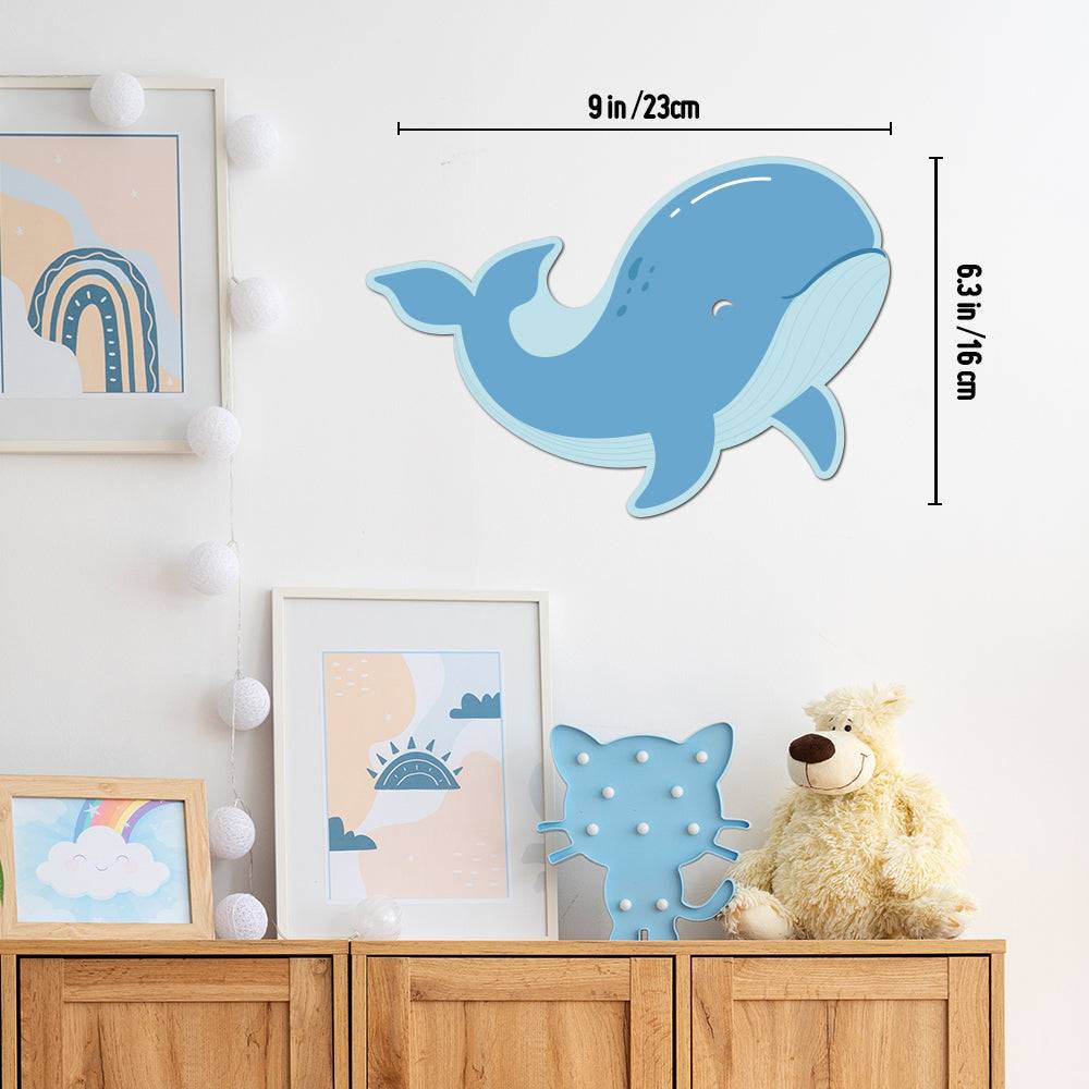 Personalized marine theme wall light with whale design, perfect for baby's room decor, soft soothing light.